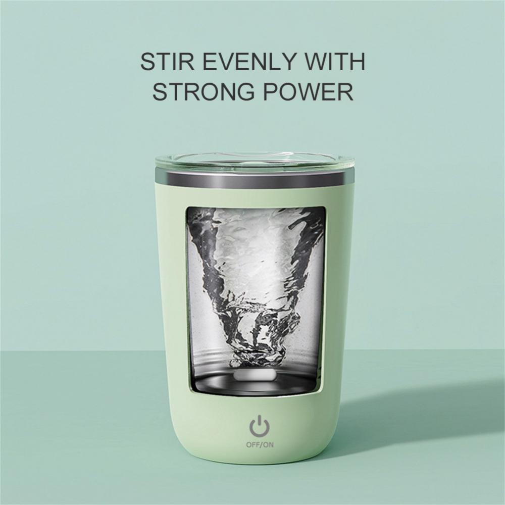 "Self-stirring mug in use mixing coffee — instant blend with one button"